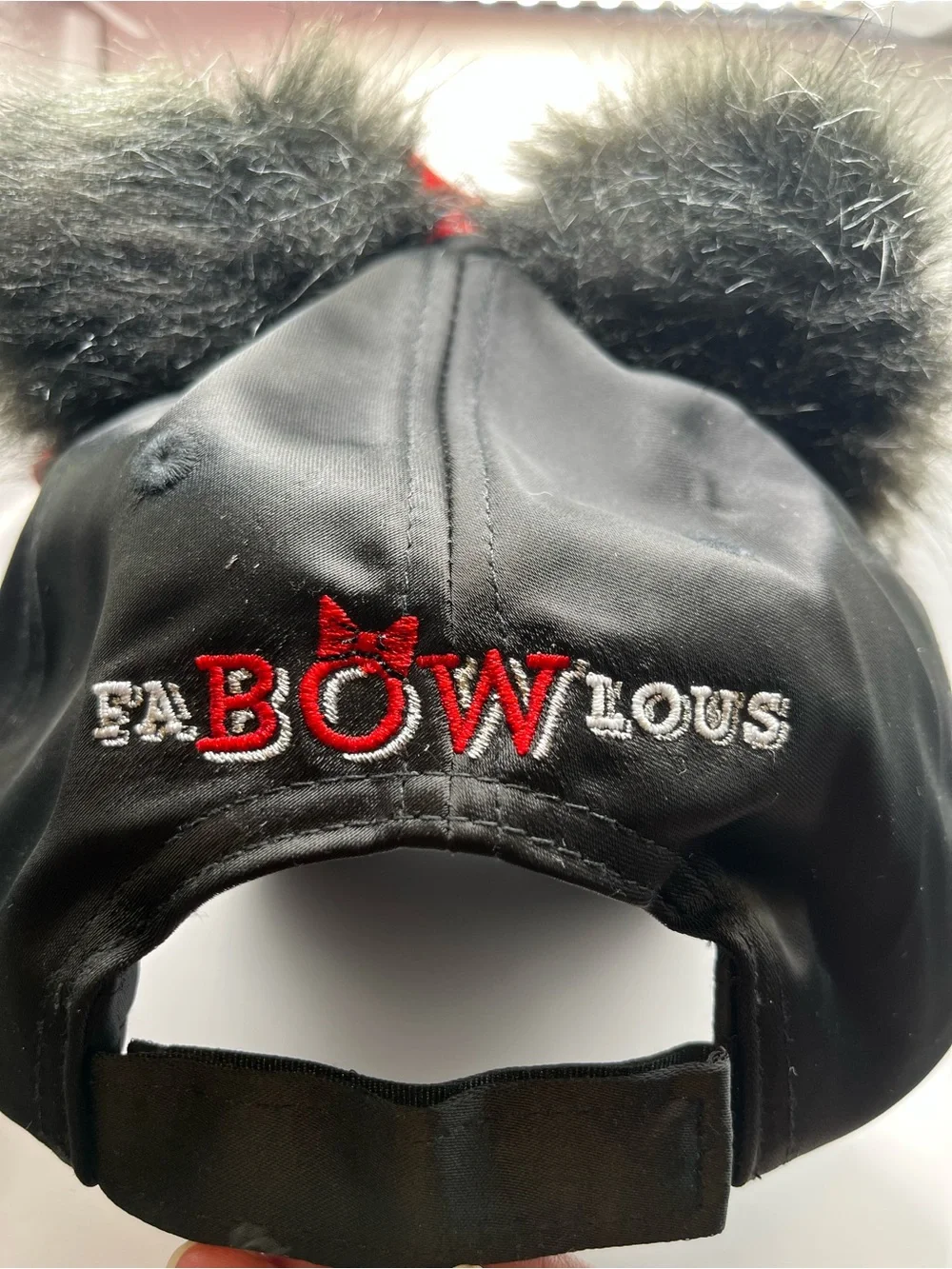 Disney Parks Black Faux Fur Ear Cap with Red Bow and Rhinestones NWOT